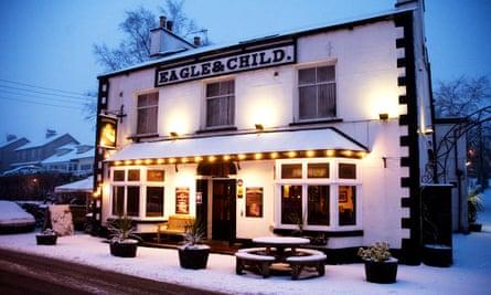 The Eagle and Child exterior with snow
